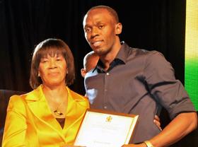 Usain Bolt and Jamaican Prime Minister on Heroes Day 