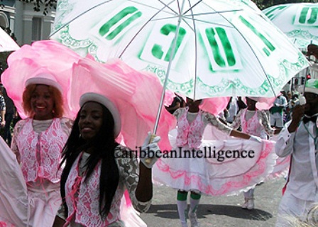 Women in pink outfits parade