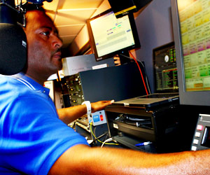 Robbo Ranx at his music desk