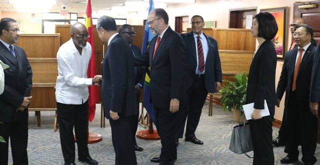 China's Foreign Affairs Minister Wang Yi meets CARICOM staff in 2018