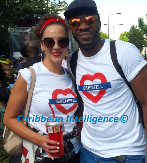 Couple in I Love Grenfell t-shirts