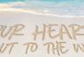 'Our hearts go out to the world' message in the sand